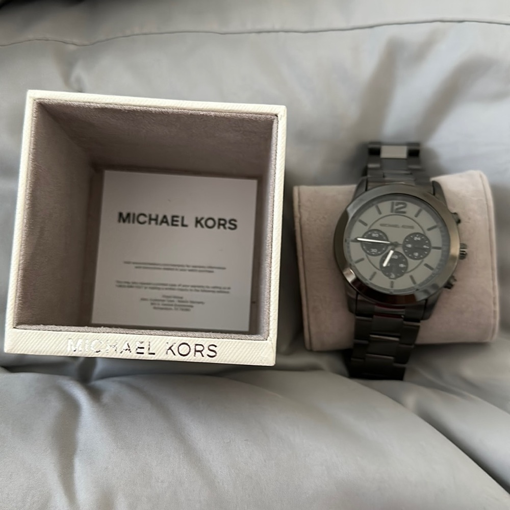 Brand new never worn black Michael Kors watch.